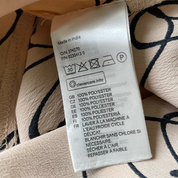 H & M rose top with feathering at neck and sleeves. - Picture 4 of 4